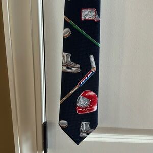Ice Hockey Themed tie. Navy Blue.